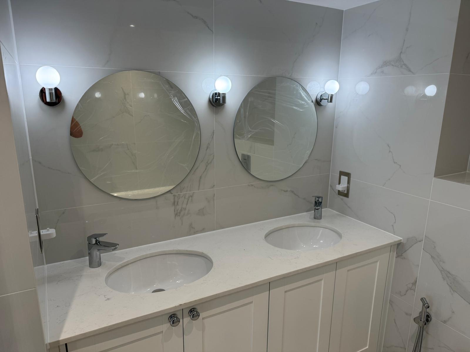 Modern bathroom installation in London by Laney Property Services